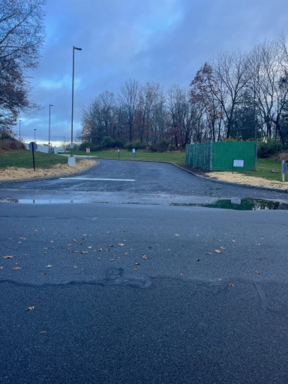 Freshly paved commercial access road and parking area after a mill-and-pave in NJ